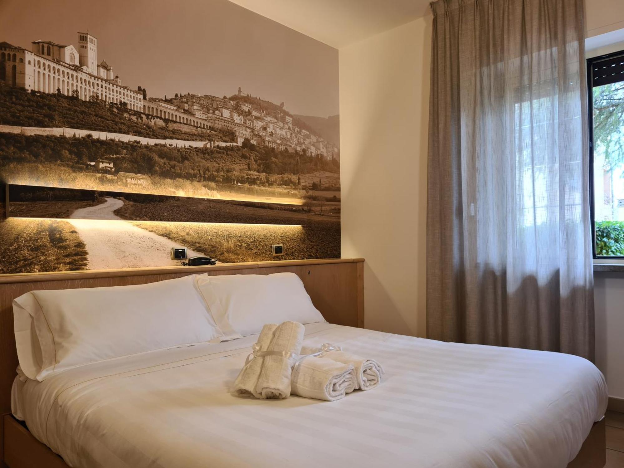 Hotel Cladan Ассізі Екстер'єр фото