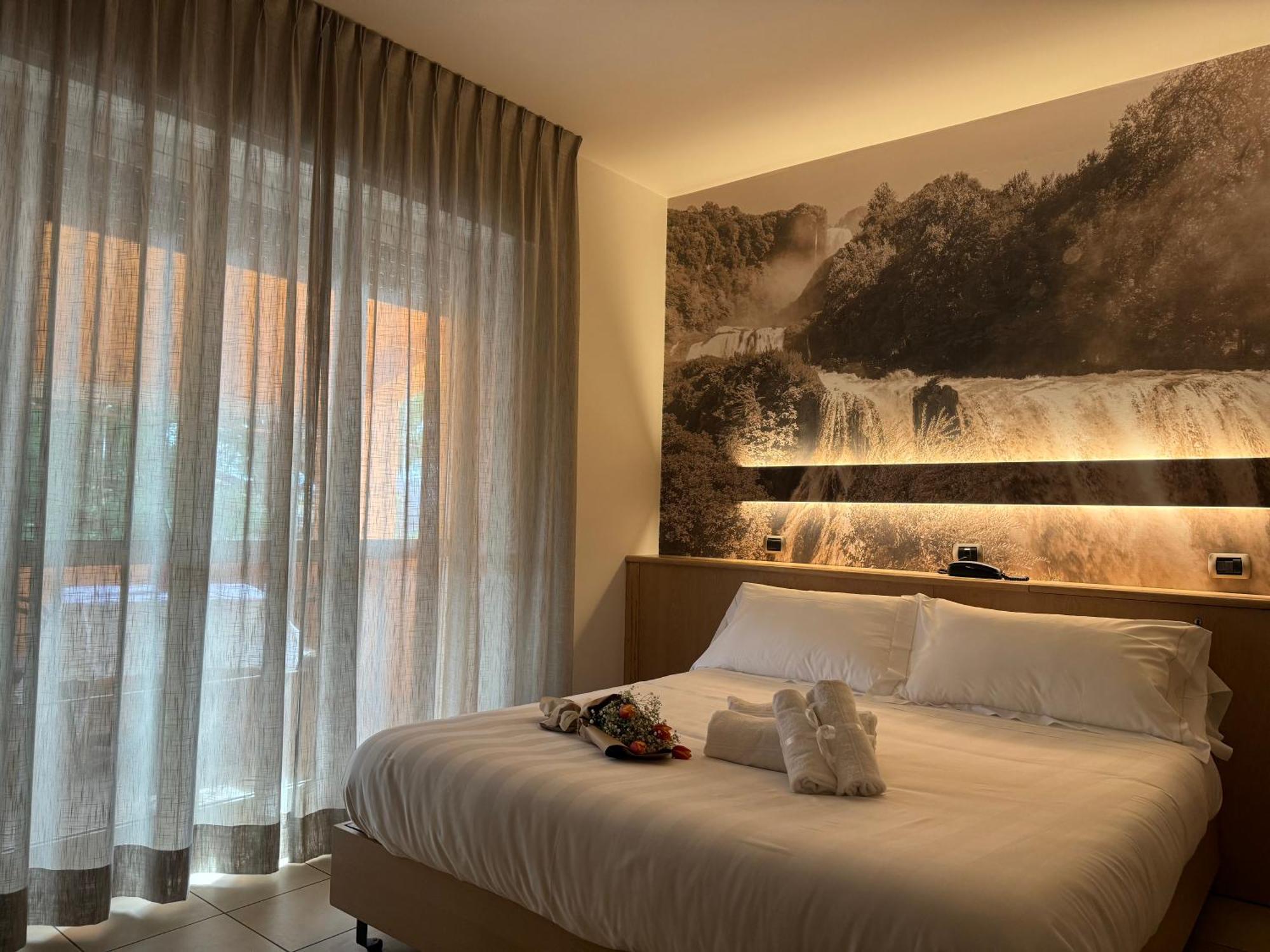 Hotel Cladan Ассізі Екстер'єр фото
